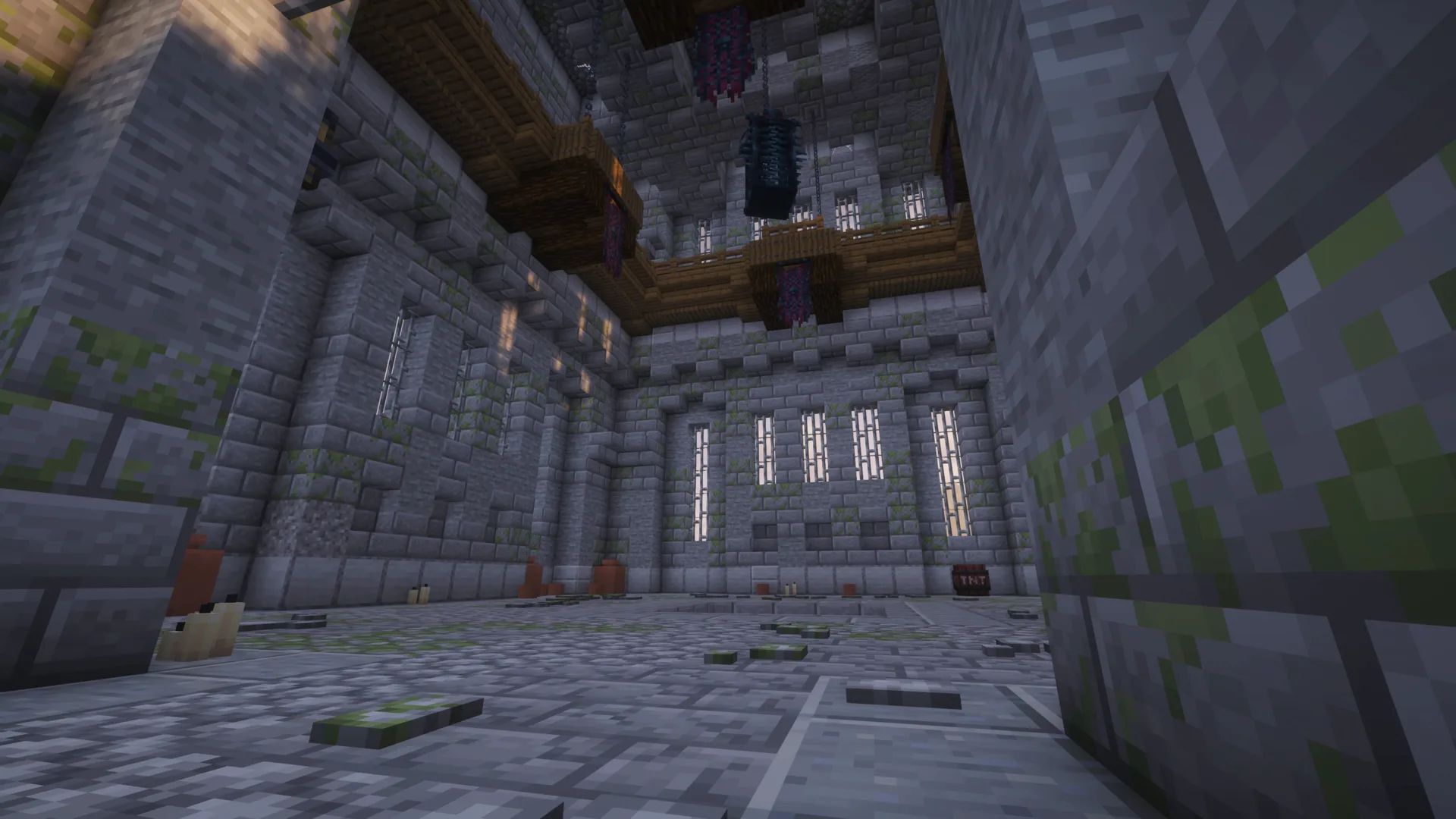 A tall ruined dungeon interior built from dark stone